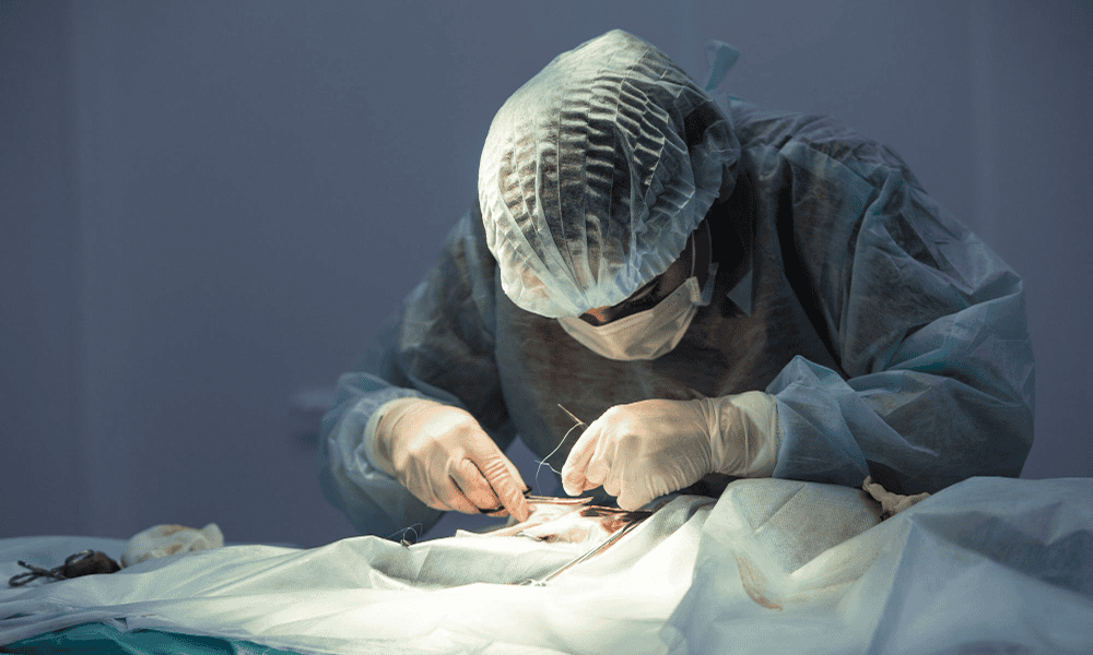 Orthopedic surgeon performing accidental and fracture surgery in operation theatre