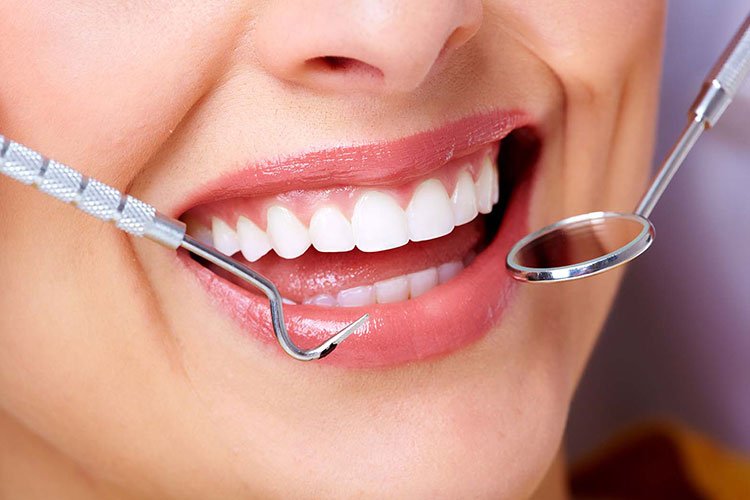 Routine dental checkup and teeth cleaning treatment by dentist in Indore